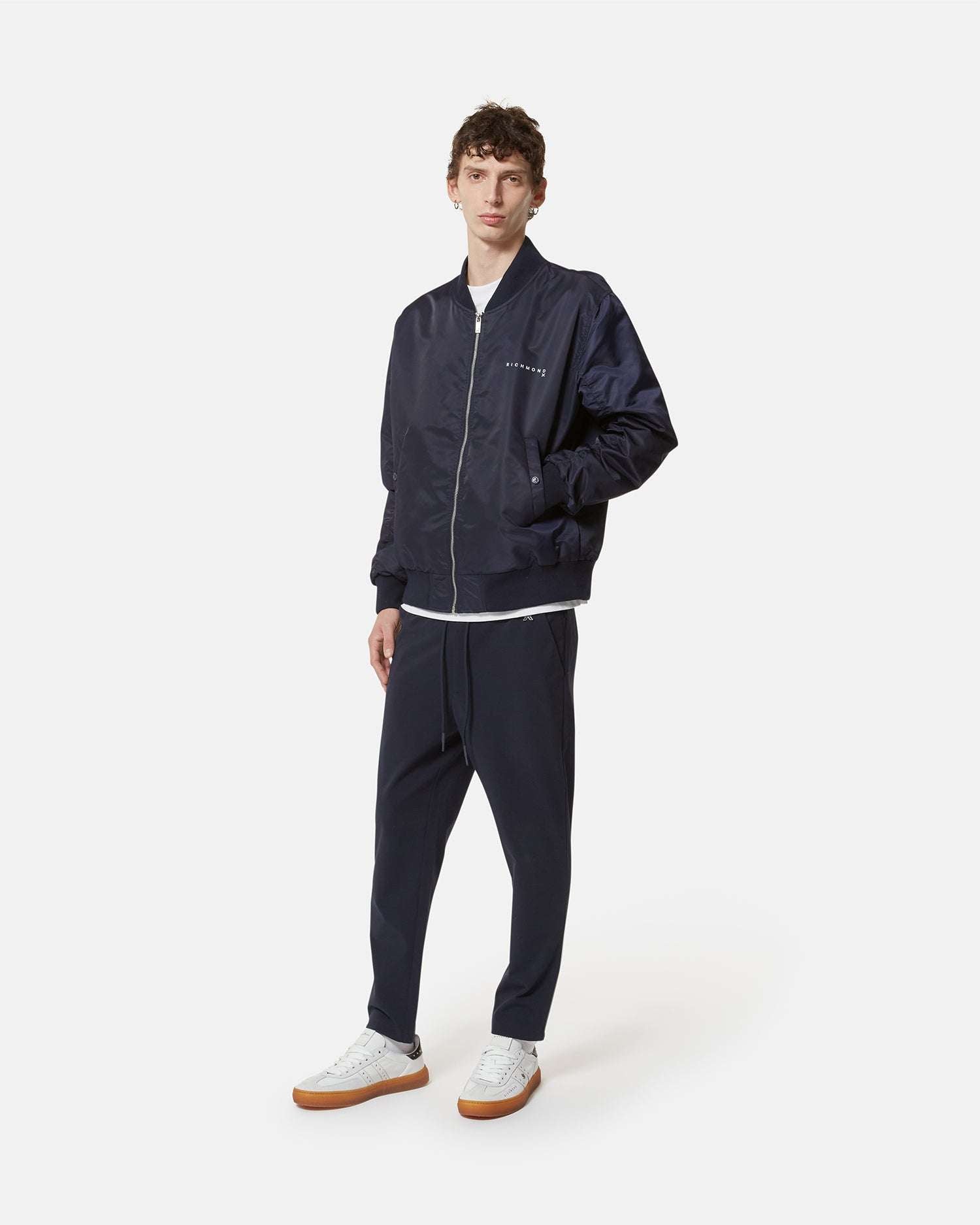 Bomber blu scuro con dettagli minimal Capospalla