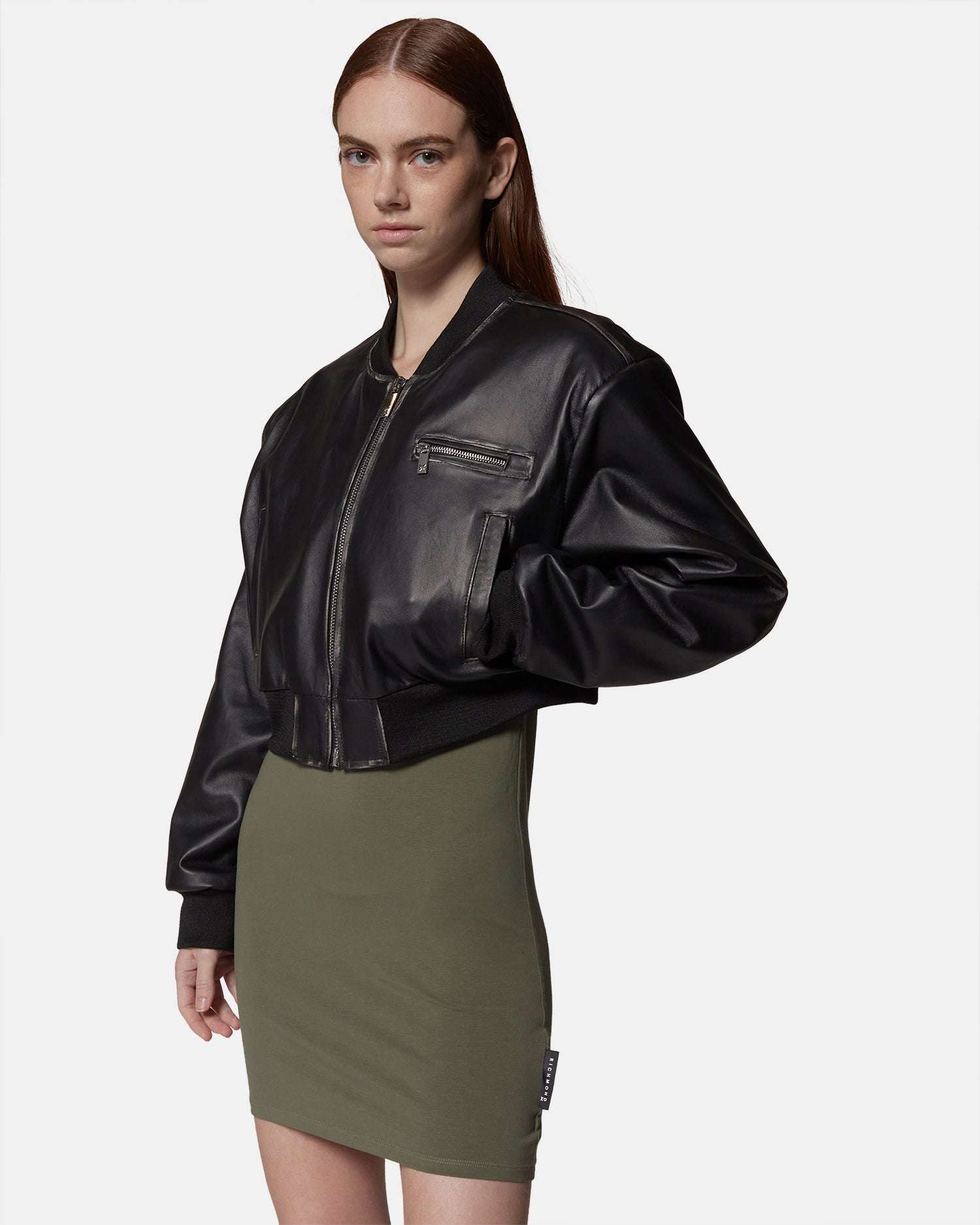 Bomber in ecopelle nera con dettagli a costine Capospalla