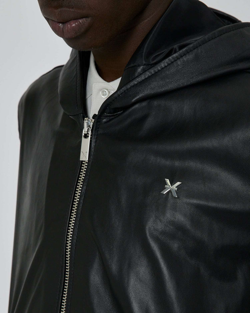 Leather jacket with metallic logo on the front 
