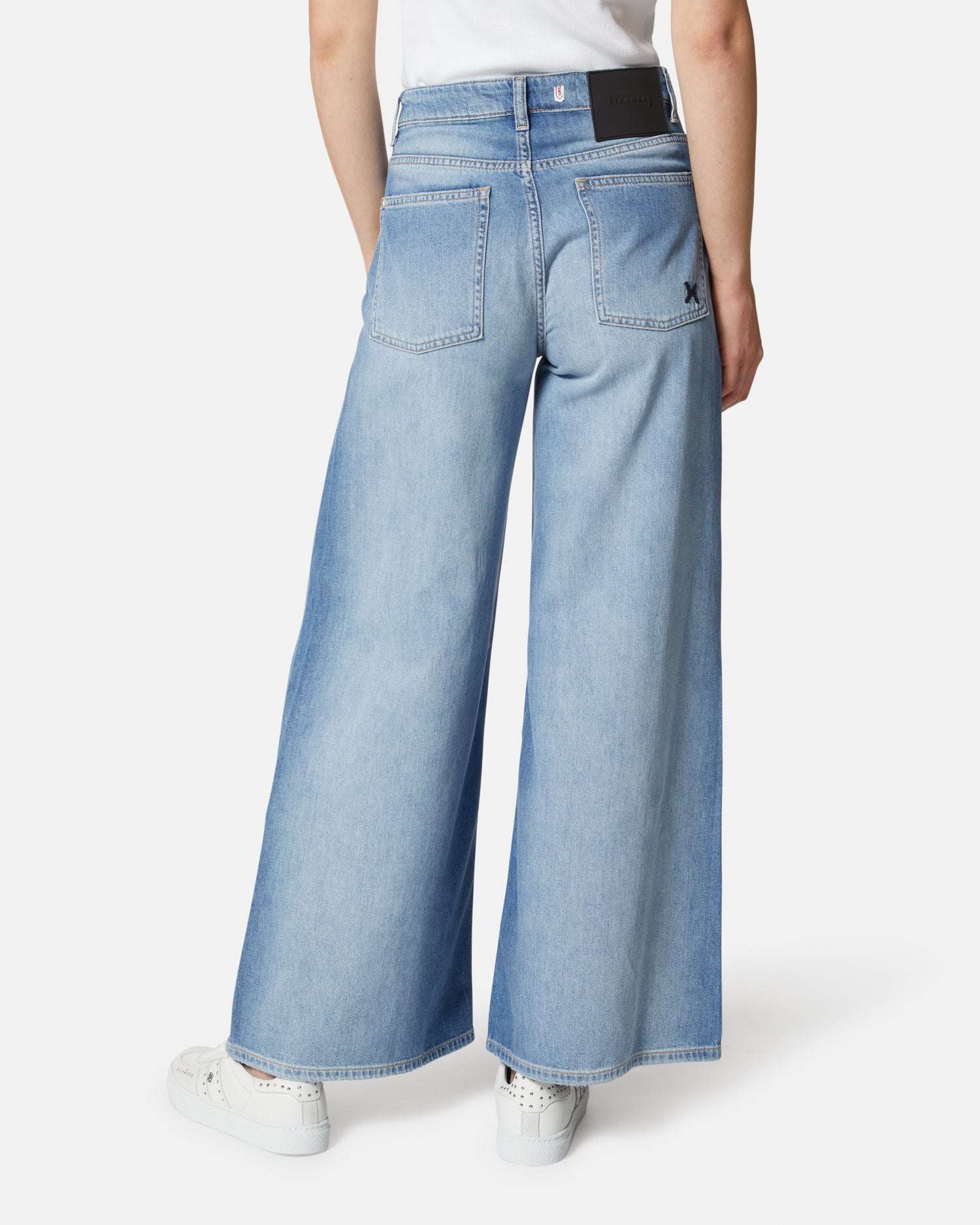 Jeans a gamba larga blu chiaro con strappi sulle ginocchia Jeans