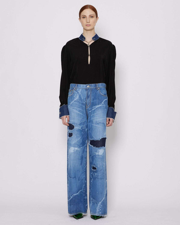 Wide leg jeans with rips in the front