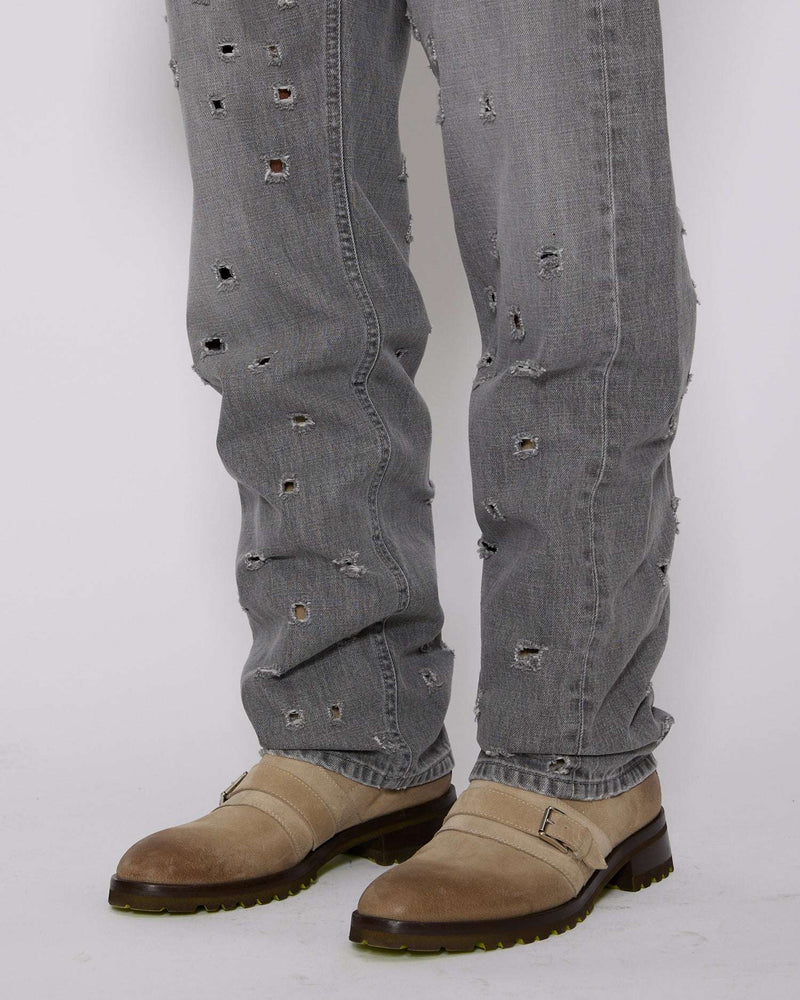Regular jeans with rips on the front