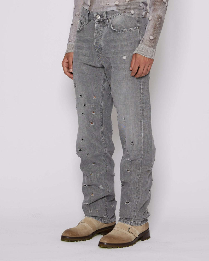 Regular jeans with rips on the front