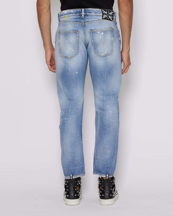 Jeans slim con lacerazioni