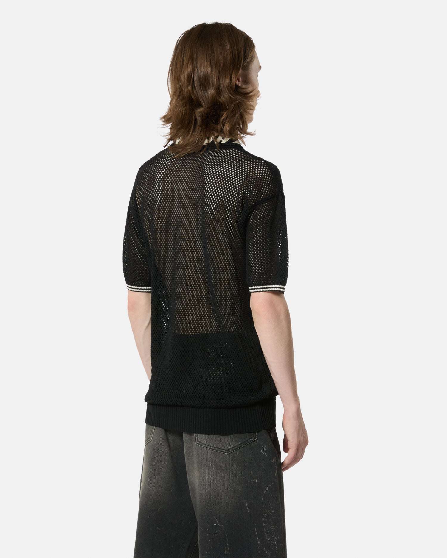 Black mesh sweater with contrasting collar and buttons. Sweater