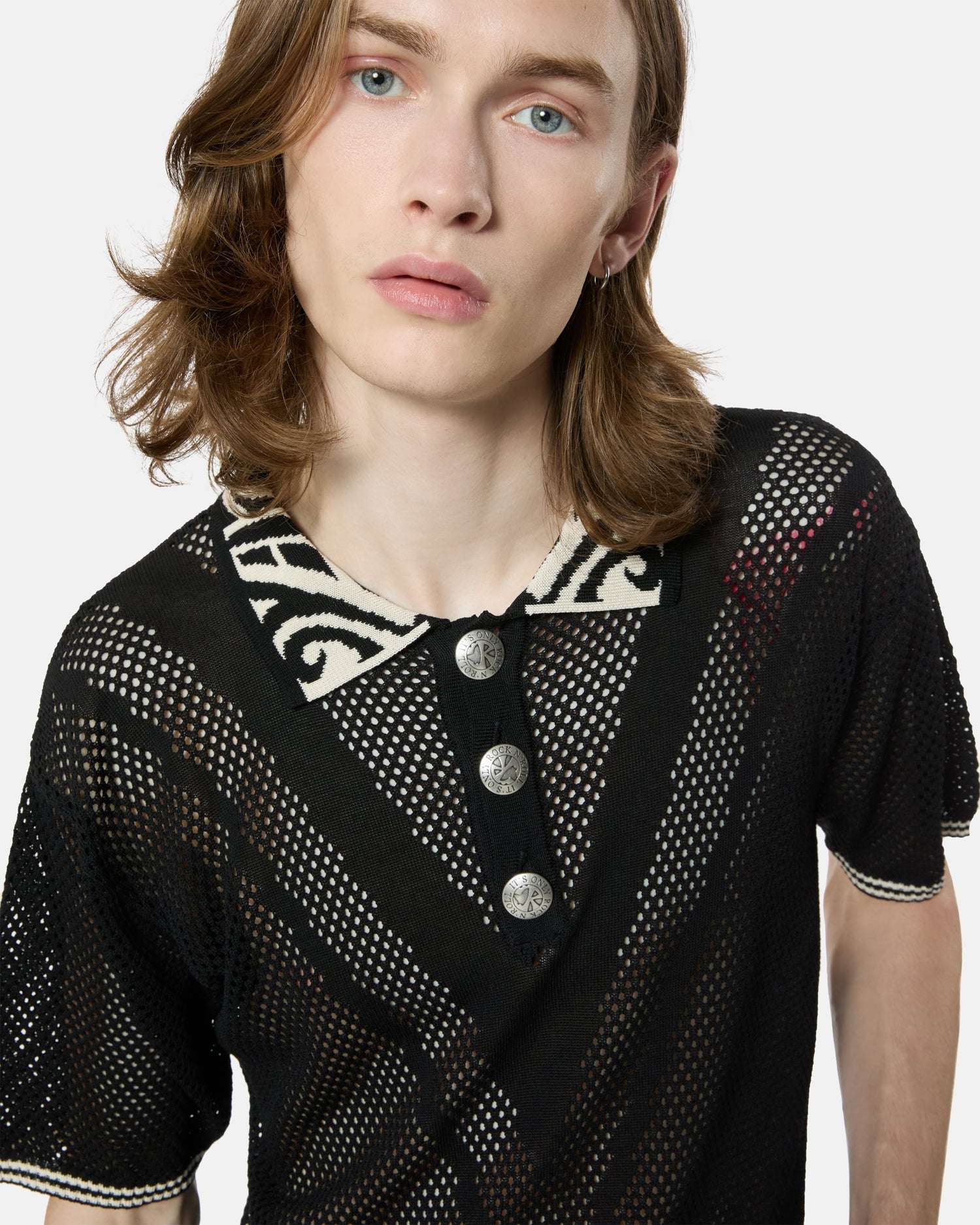 Black mesh sweater with contrasting collar and buttons. Sweater