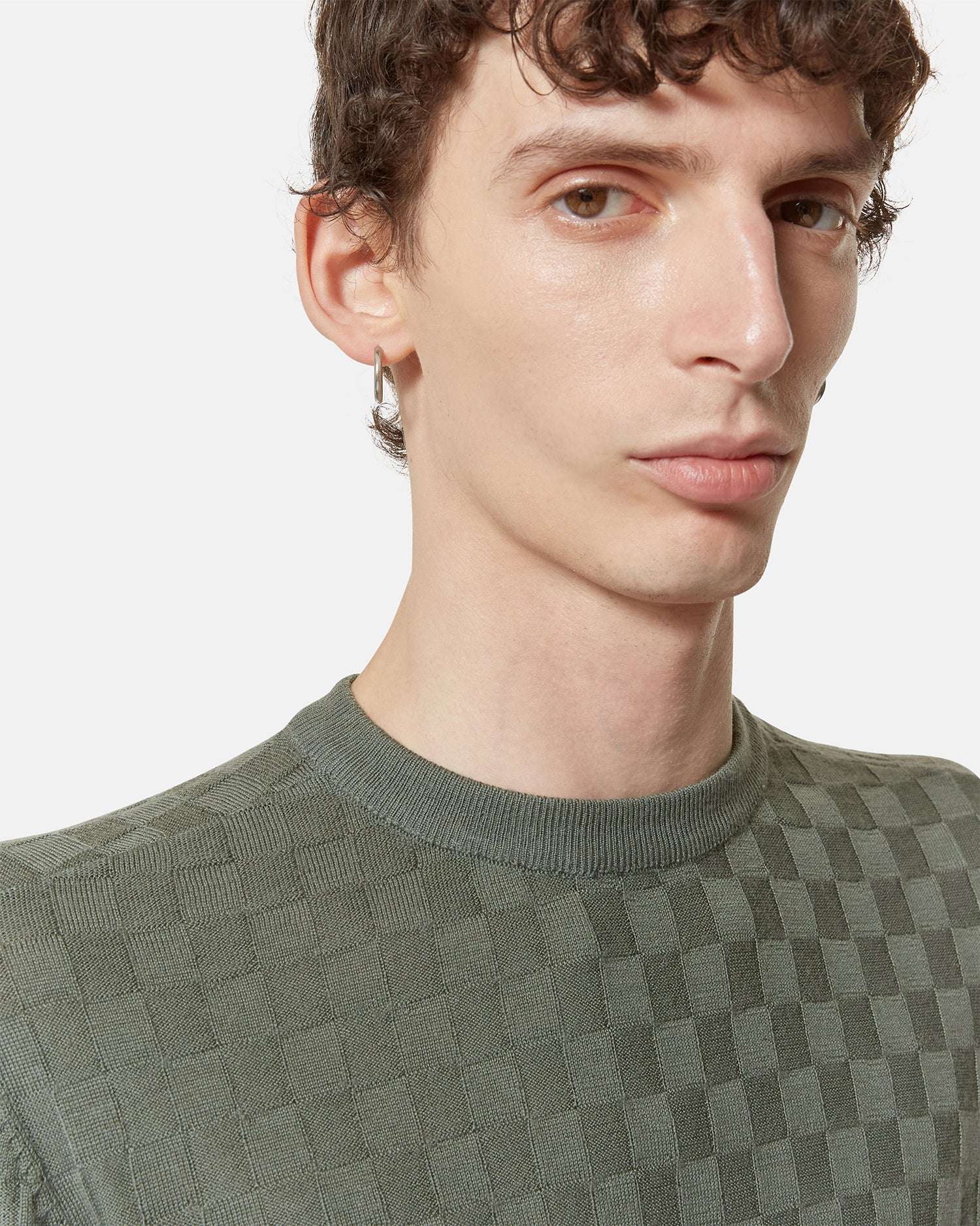 Crew-neck sweater with geometric knitting. Sweater