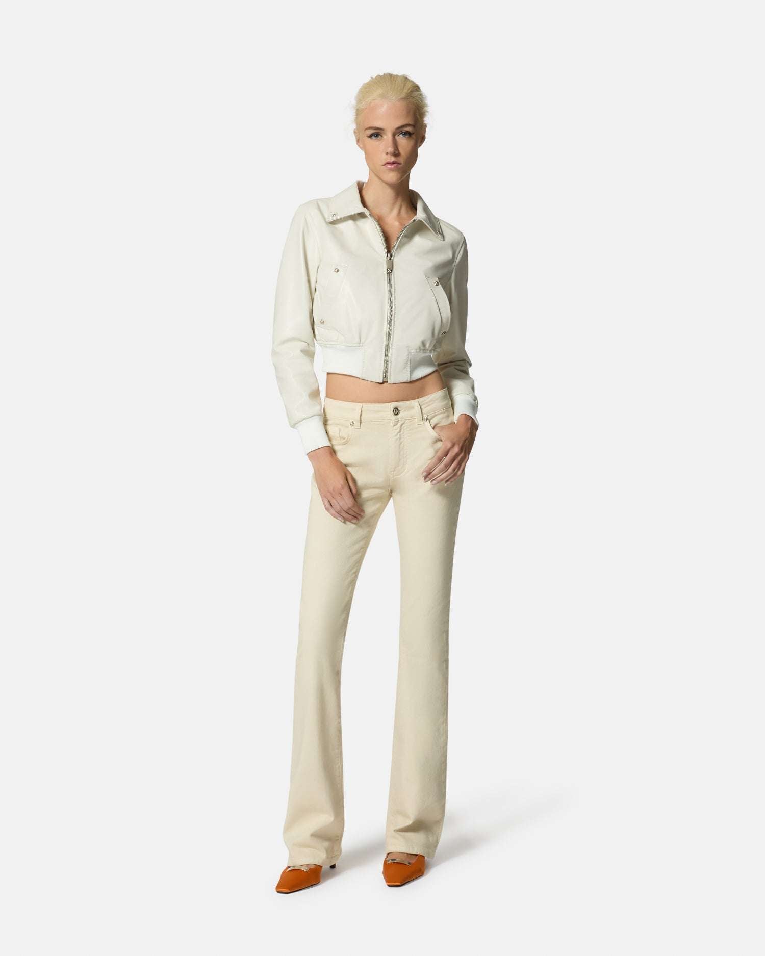 Pantaloni beige a zampa con vita alta Pantaloni