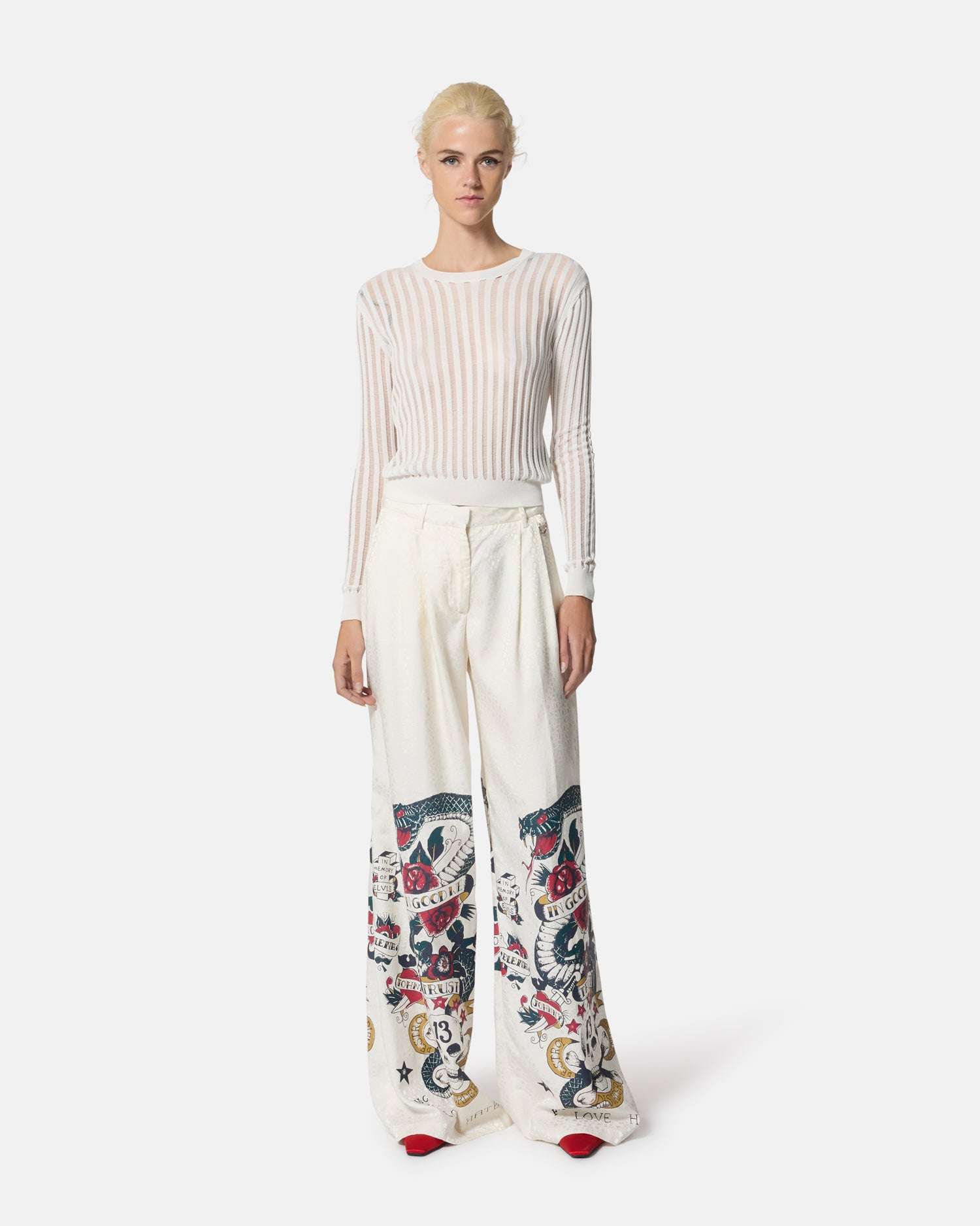 Pantaloni bianchi con stampa grafica e vita alta Pantaloni