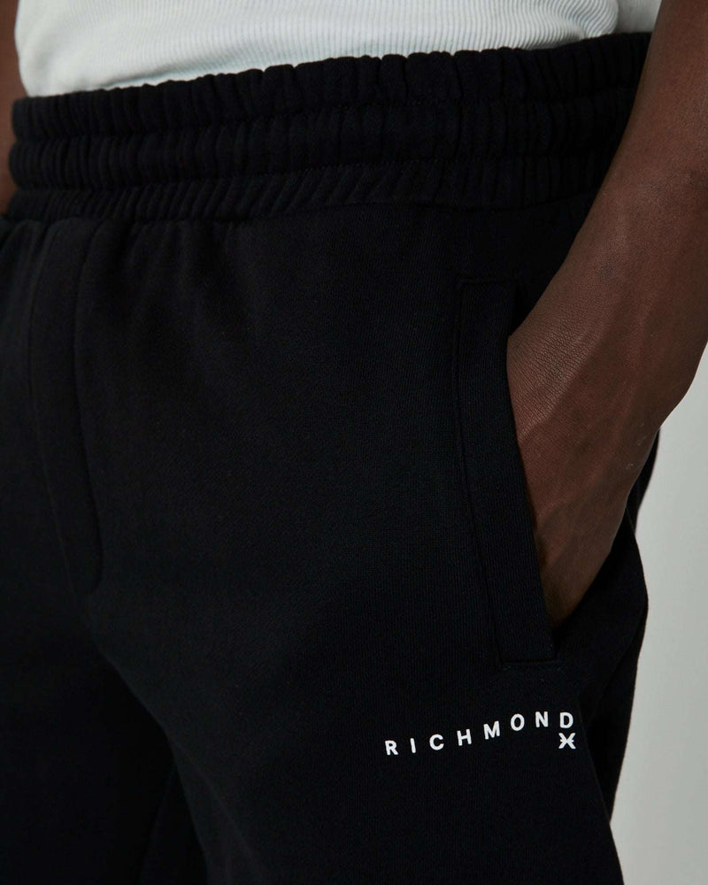 Jogging pants with logo on the front