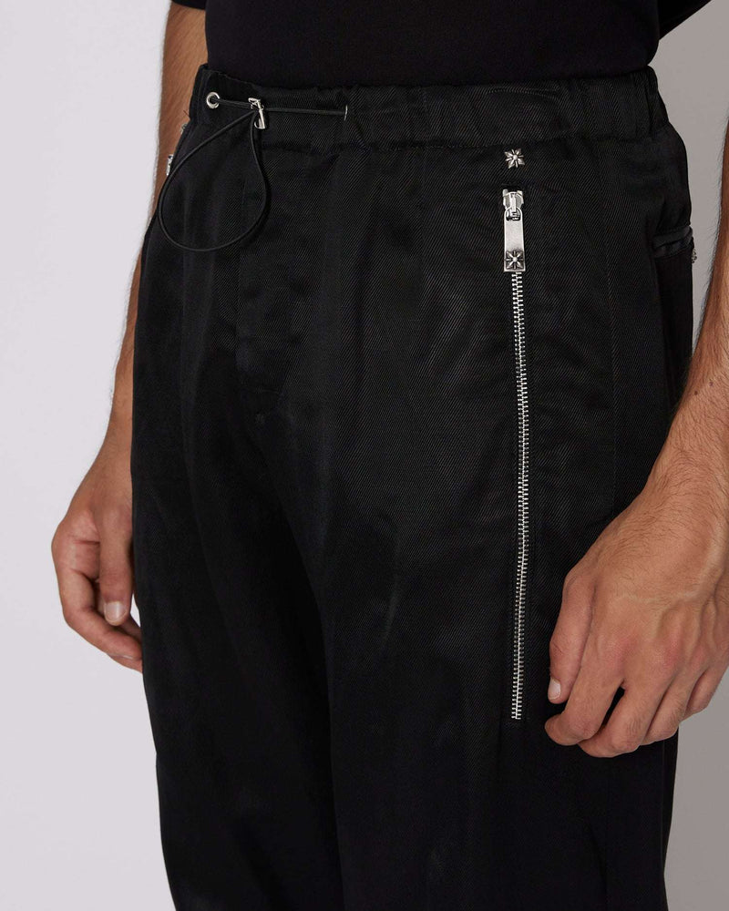 Pantaloni regular con zip decorative
