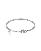 Bracciale a catena con maglie allungate, elemento centrale con punti luce e charm a forma di croce.