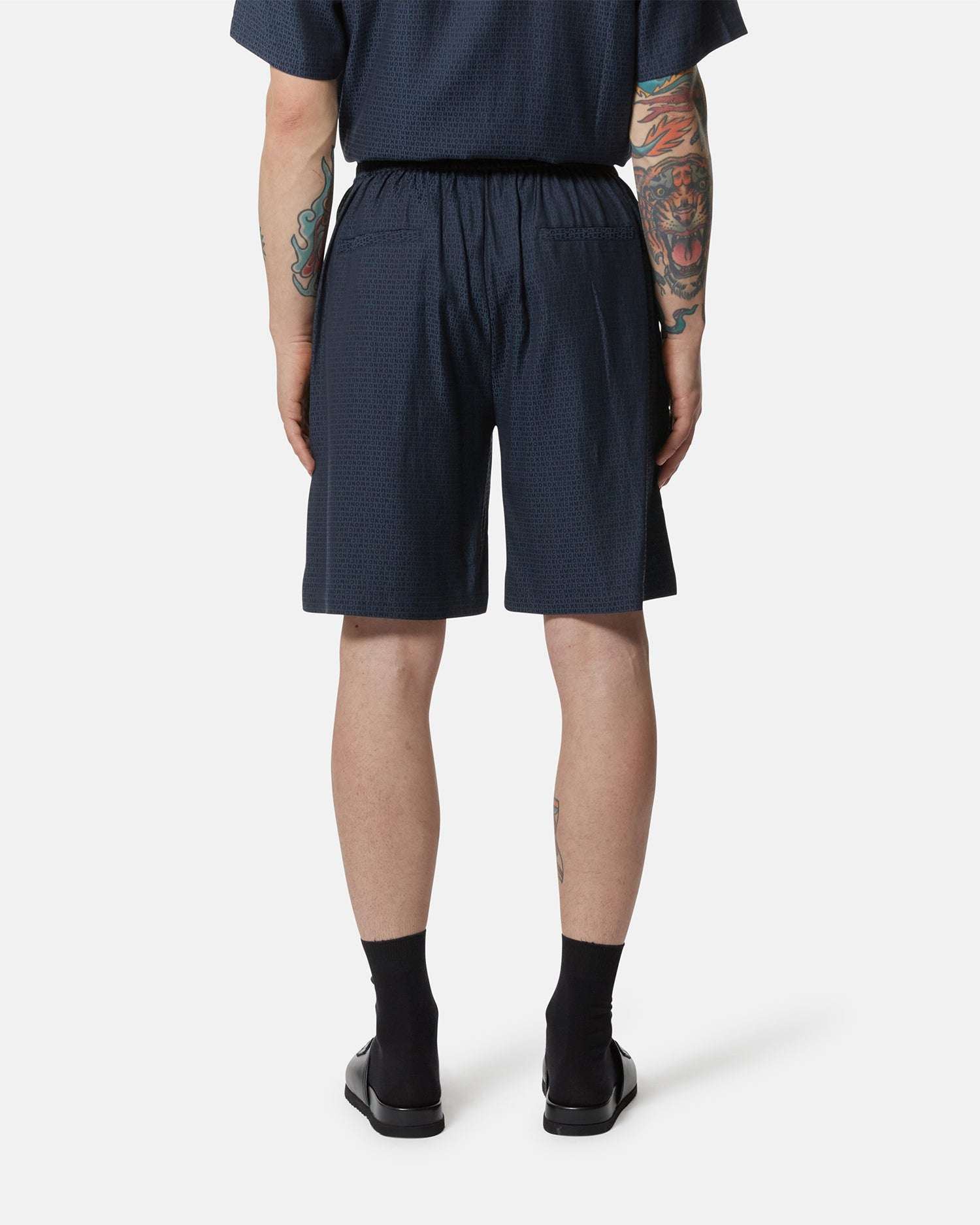 Bermuda a vita alta con design minimal e tessuto lavorato Bermuda