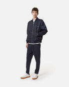 Bomber blu scuro con dettagli minimal Capospalla