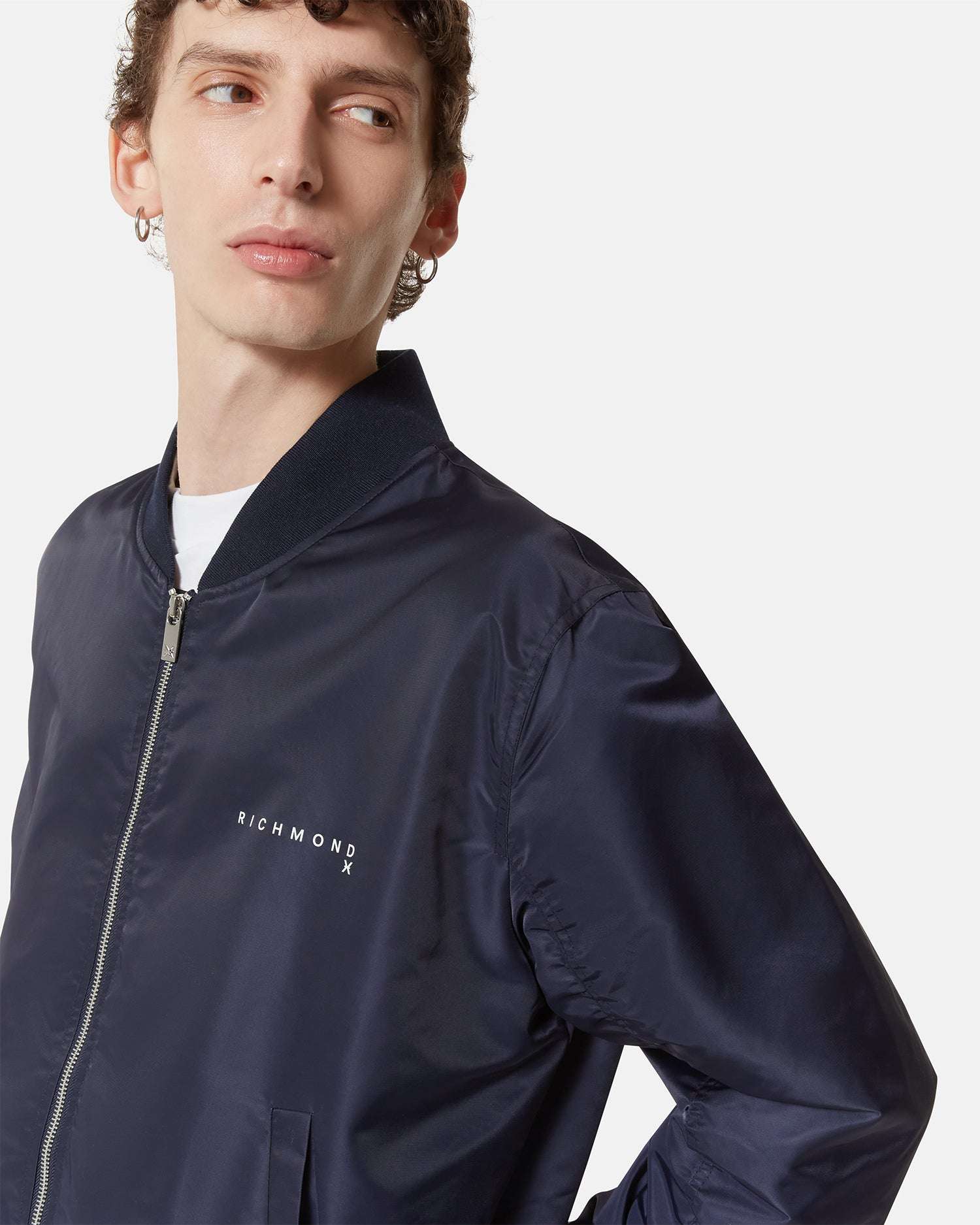 Bomber blu scuro con dettagli minimal Capospalla