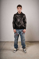 Bomber in ecopelle con zip e finiture a costine Capispalla