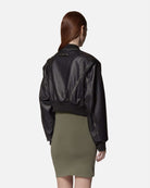 Bomber in ecopelle nera con dettagli a costine Capospalla