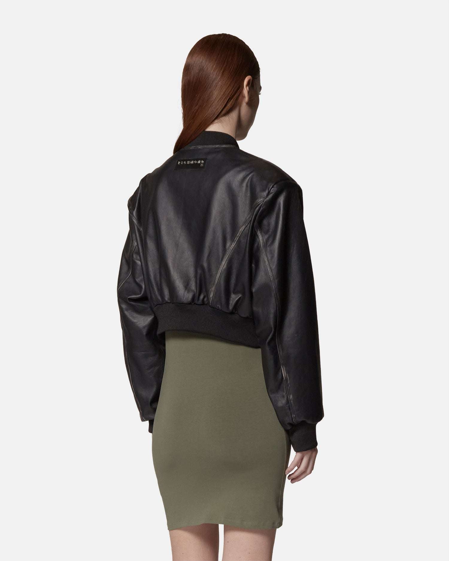 Bomber in ecopelle nera con dettagli a costine Capospalla