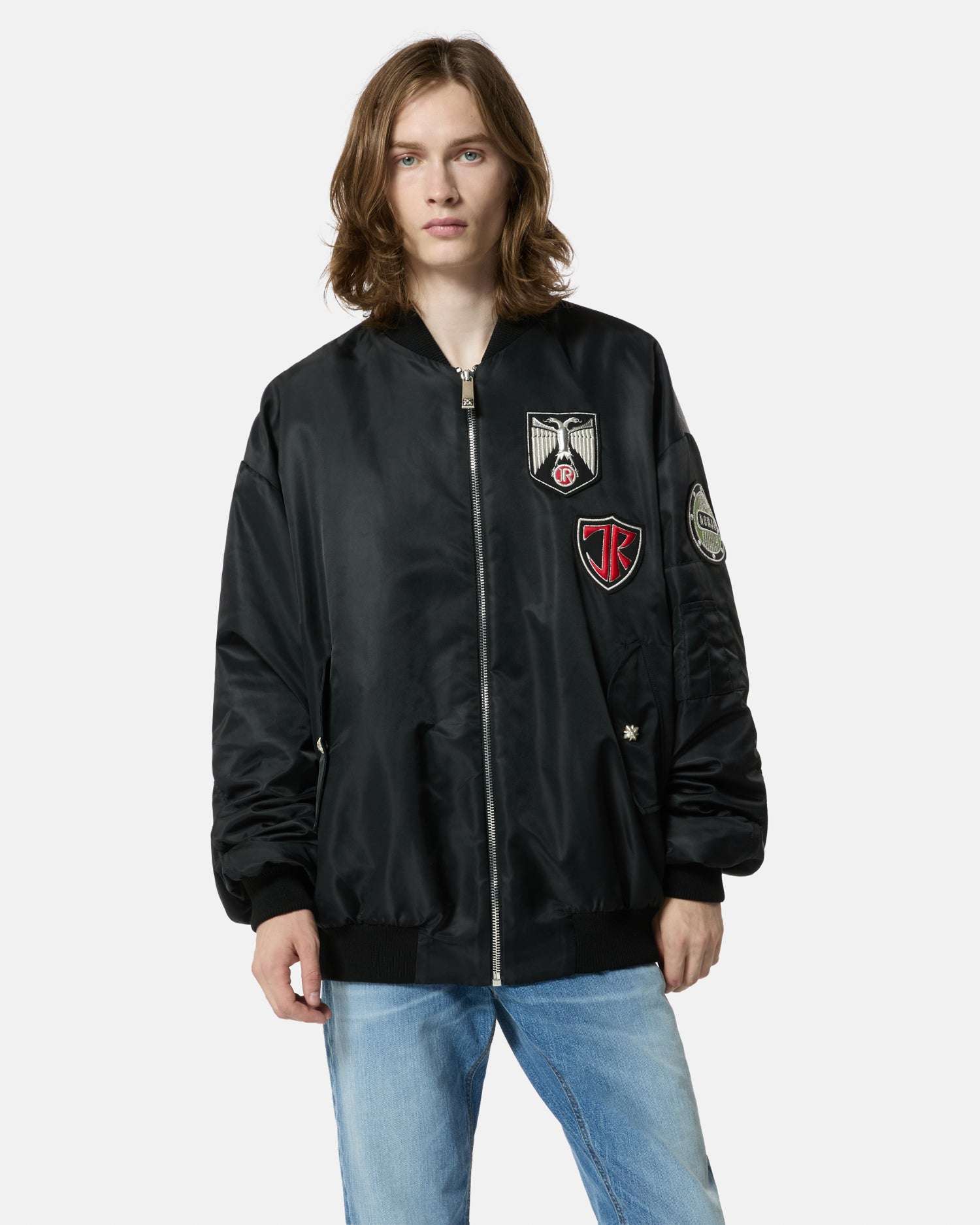 Bomber nero con patch applicati Capospalla