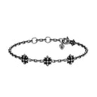 Bracciale in metallo con fiori decorativi