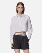 Camicia cropped bianca con tasca applicata Camicia