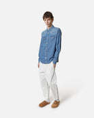 Camicia in denim blu con tasche frontali e bottoni metallici Camicia