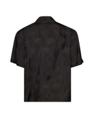 Black men's short-sleeved shirt with tone-on-tone pattern. Shirt