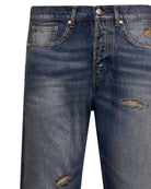 Jeans con effetto used e dettagli distressed Jeans