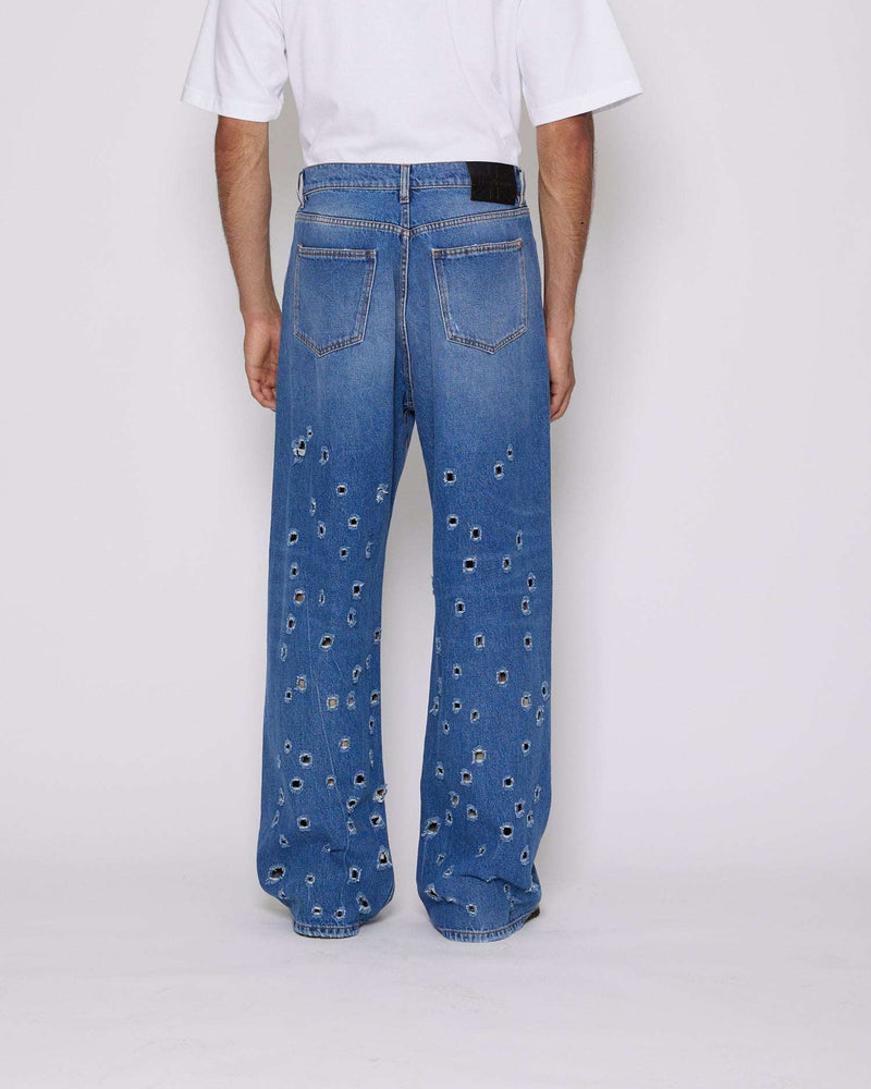 Wide leg jeans with metal holes on the front