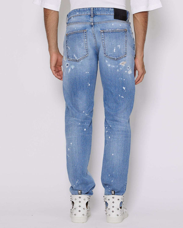 Jeans slim con strappi sul davanti