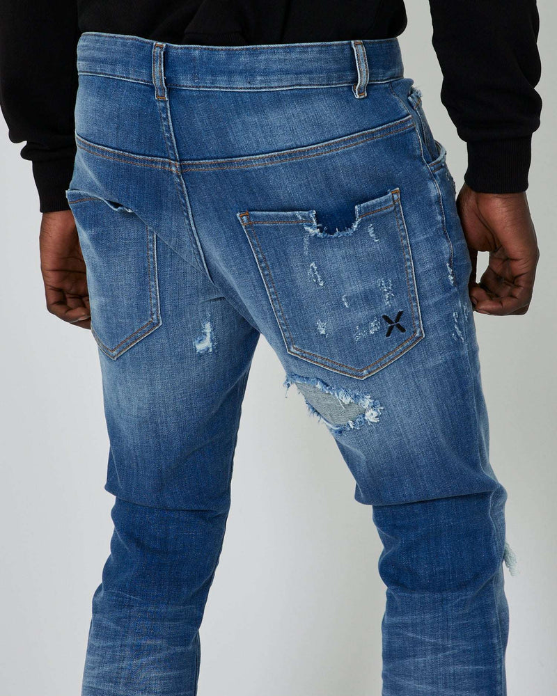 Slim jeans with rips in the front