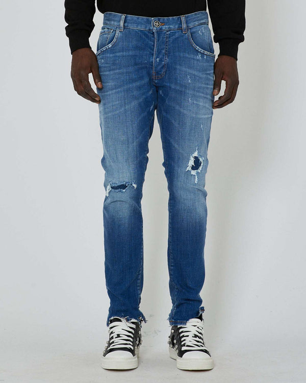 Slim jeans with rips in the front
