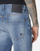 Jeans slim fit con effetto distressed JEANS