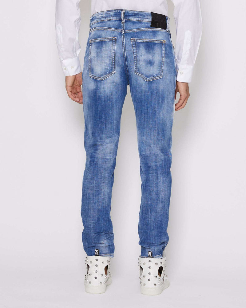 Jeans slim con lavaggio effeto used