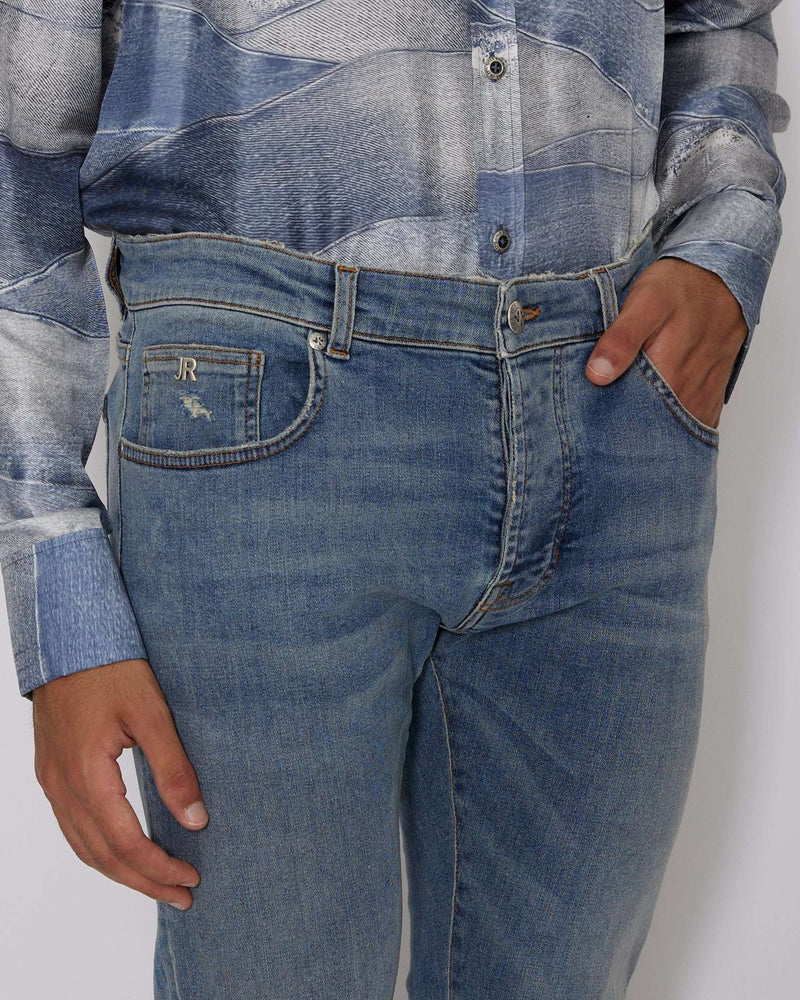 Jeans slim con lavaggio effetto used