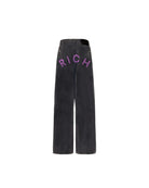 Jeans super baggy in denim nero con lettering "RICH" Jeans