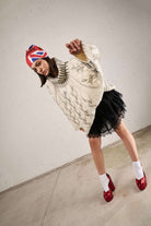 Oversized cable knit sweater with turtleneck