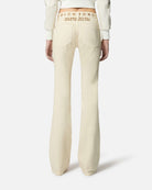 Pantaloni beige a zampa con vita alta Pantaloni