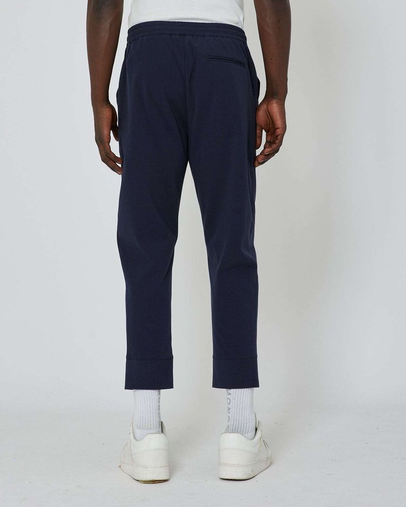 Jogging pants with metallic logo on the front