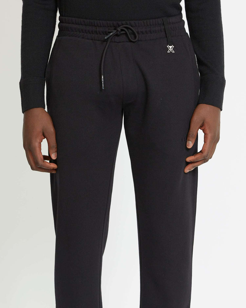 Jogging pants with logo on the front 