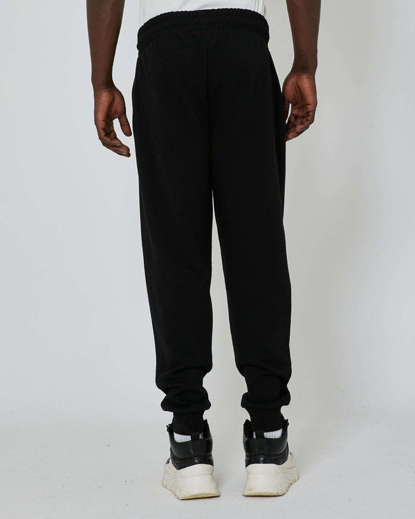 Jogging pants with logo on the front