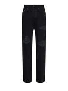 Pants with an essential design with discreet distressed details JEANS