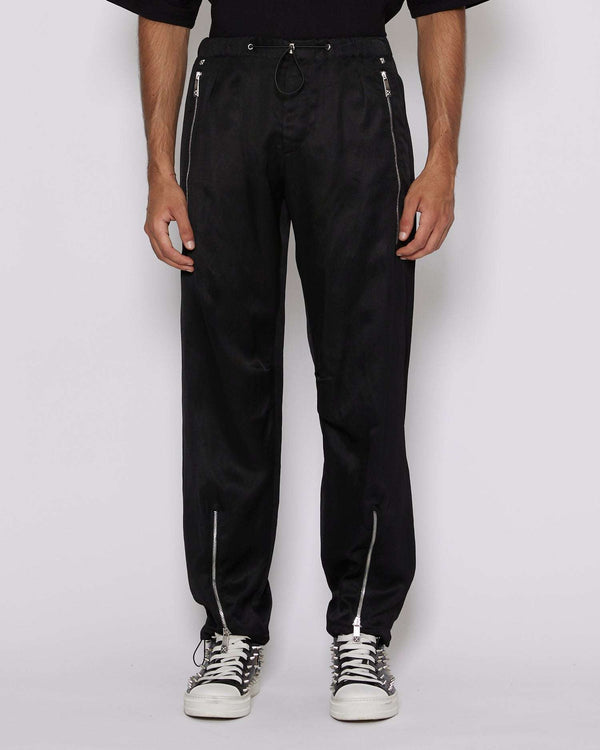 Pantaloni regular con zip decorative
