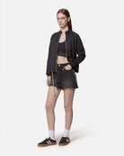 Shorts in denim nero effetto destroyed Shorts