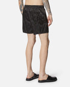 Shorts in tessuto lucido nero con vita elasticizzata Shorts