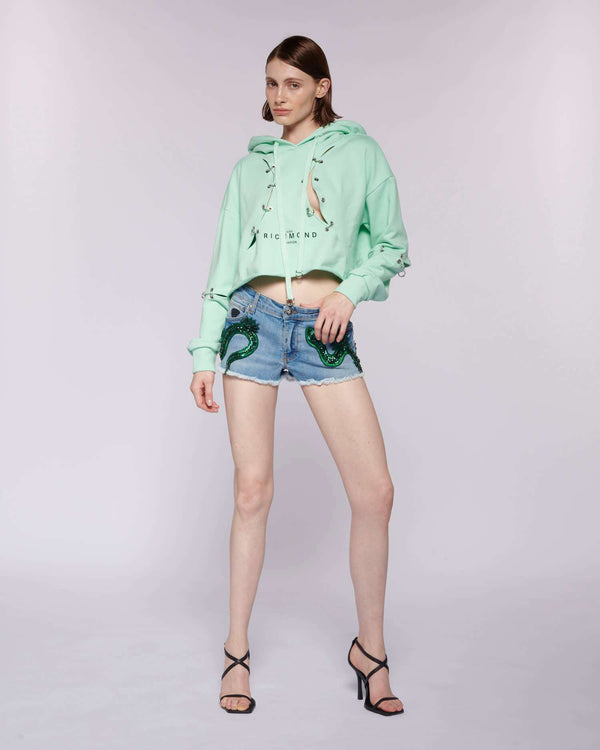 DENIM SHORTS WITH SEQUINED SNAKE